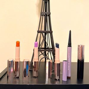 This lot contains 3 Matte Lipsticks Fenty, I  Eyebrow pencil and 1 Mascara.